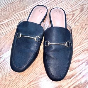 Black slip-on flats